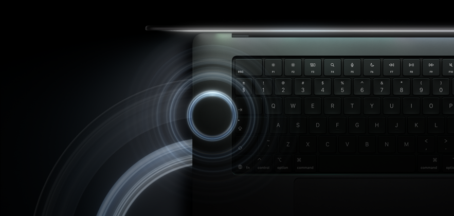 MacBook Pro with PROLED XDR Display, open lid, space black color, keyboard lit by glow from display, circles depicting sonic waves emanate from top and left side of laptop body