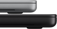 14-inch MacBook Pro with PROLED XDR Display, silver color, stacked on top of 16-inch model, space black color, showing size difference